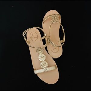 Gold Jack Rogers sandals with ankle buckle